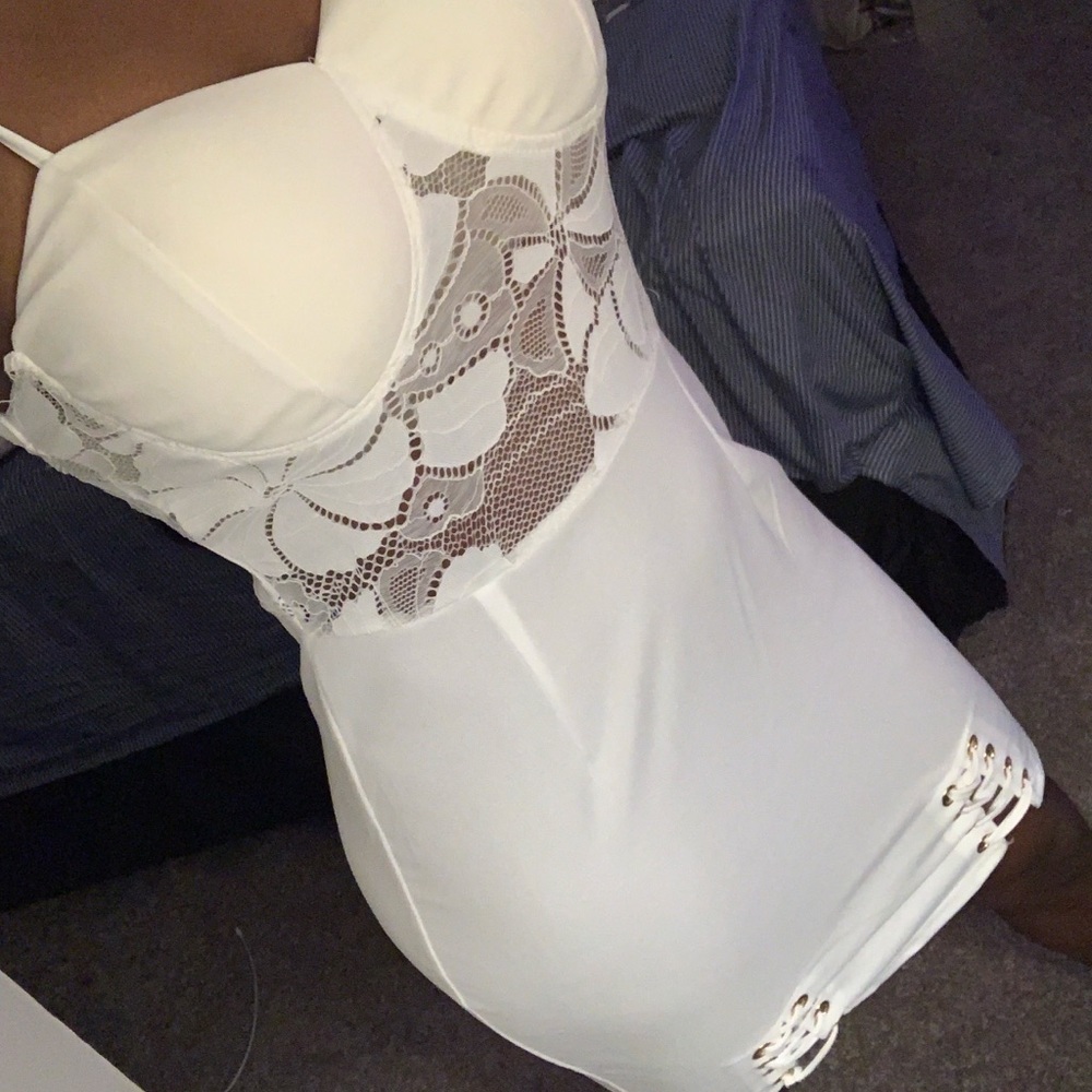 White dress with lace at the bottom